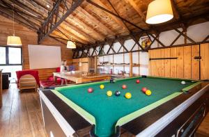 a billiard room with a pool table at Huttopia Font Romeu in Font-Romeu