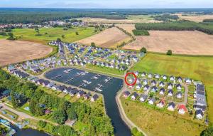 an aerial view of a parking lot with a marina at Hafenhaus Zerpenschleuse in Wandlitz