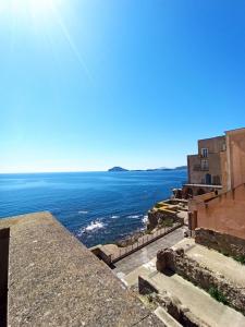 a view of the ocean from a building at Marisella holidays house in Pozzuoli