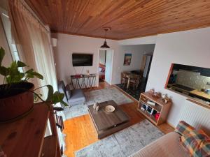 an overhead view of a living room with a television at Cosy apartment in Sparta in Sparta