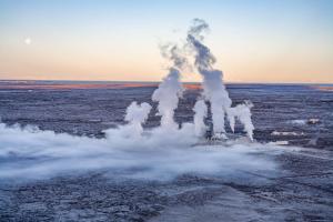 an image of a geyser with steam coming out at Northern Light Inn in Grindavík