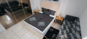 a model of a bedroom with a bed in a room at Apartmán Vlasta in Arona