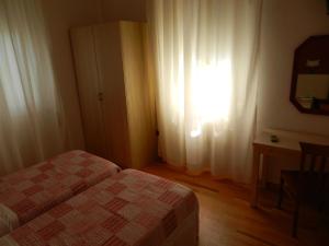 Voodi või voodid majutusasutuse Hotel Paradiso toas