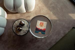 two bowls with spoons in them on a table at Fahrenheit Seven Les Menuires in Les Menuires