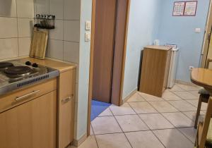 a kitchen with a sink and a stove in it at Modrina in Kobarid +28 photos