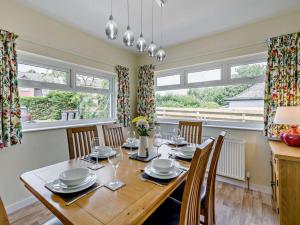 a dining room with a table and chairs at 3 Bed in Dumfries oc-96066 in Dumfries