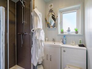 a bathroom with a shower and a sink at 1 Bed in Girvan oc-78072 in Girvan