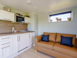 a living room with a couch and a kitchen at 1 Bed in Girvan oc-78073 in Girvan