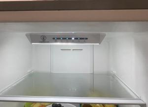 a kitchen with a stove top oven in a room at Music and Words in Oeiras
