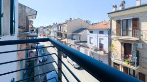 a view of a city street from a balcony at BORGO MARE 86 rooms in Porto SantʼElpidio