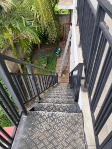 an overhead view of a stairway with a railing at Dissanayaka house in Nikawatawana