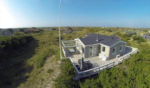 an overhead view of a house on top of a field at VE361-Vejers-Strand-Violvej-4 in Vejers Strand