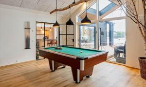 a billiard room with a pool table in it at VE250-Vejers-Strand-Engesovej-56 in Vejers Strand
