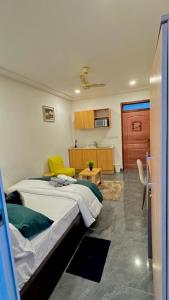 a bedroom with a large bed in a room at Mayama Residences in Accra +30 photos