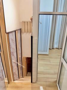a room with a glass door and a mirror at Onny's Palace in Bari +32 photos