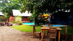 Bazén v ubytování Hotel Cabanas La Teca nebo v jeho okolí