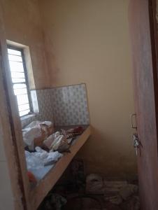 a room with a bed in a room with a window at Parijat Talpuri rishali in Durg