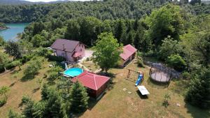 an aerial view of a house with a swimming pool at House Kiki by Villas Guide in Bosiljevo