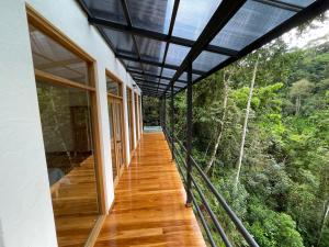 a hallway of a house with a glass roof at Cascada Elysiana in Platanillo