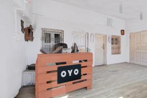 an empty room with a sign that says oo at hotel O snow breeze adventures in Dhanaulti +22 photos
