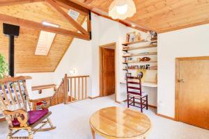 a dining room with a table and two chairs at Wren Ridge in Pagosa Springs