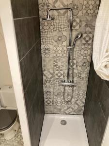 a shower stall in a bathroom with a toilet at Cassis et ses merveilleuses Calanques in Cassis +49 photos