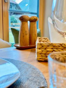 a table with two wooden containers on top of it at Hirsere Studio 2 in Ursenbach