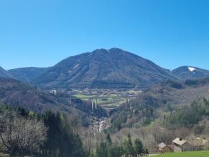 a mountain view of a valley in the mountains at Rax-Basecamp 24 in Reichenau +9 photos
