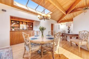 a dining room with a table and chairs at Del Mar Point in Sea Ranch