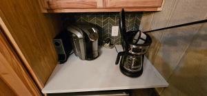 a coffee maker on a counter in a kitchen at Catch'em AK - Eagles Nest in Soldotna