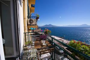 a balcony with a view of the ocean at Residenza sul mare 2 in Naples