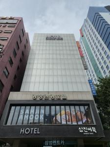 a hotel building in the middle of a city at 광장관광호텔 in Pusan