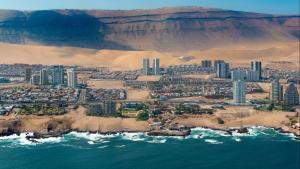 an aerial view of a city on the beach at Edificio iquique obispo labbe 830 in Iquique