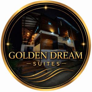 a gold dream suites logo on a round label at Golden DREAM Suites cocon modern in Capesterre-Belle-Eau