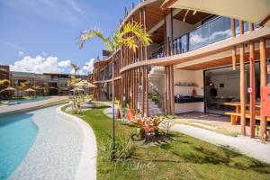 an external view of a house with a swimming pool at Naay - Sun 008 in Pôrto de Pedras
