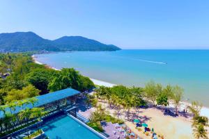 an aerial view of a resort with a beach at Angsana Teluk Bahang, Penang in Batu Ferringhi