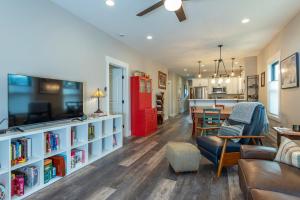 a living room with a couch and a dining room at Roam Inn in Black Mountain
