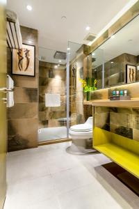 Vannas istaba naktsmītnē Oakwood Hotel & Residence Suzhou