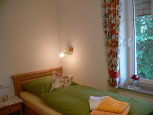Una cama o camas en una habitación de Gasthof Engel