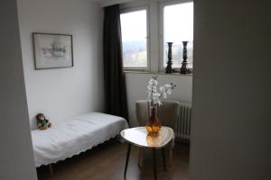 Postel nebo postele na pokoji v ubytování Orchidee Altenau