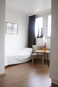 Postel nebo postele na pokoji v ubytování Orchidee Altenau