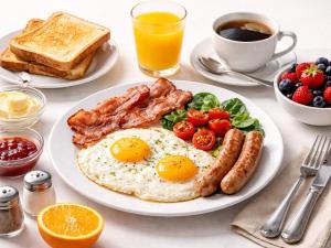 a plate of breakfast food with eggs bacon and toast at Kyrgyz Yurt Camp in Mineralʼnyy Istochnik Altyn-Arasan