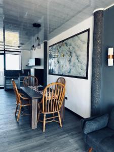 a dining room with a table and chairs at Casa Campamento in La Cueva