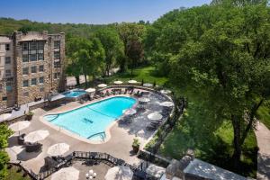an overhead view of a swimming pool at a hotel at The Elms Hotel & Spa, a Destination by Hyatt Hotel in Excelsior Springs