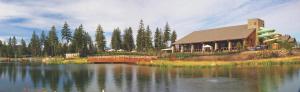 a building on an island in the middle of a lake at Suncadia Resort in Cle Elum