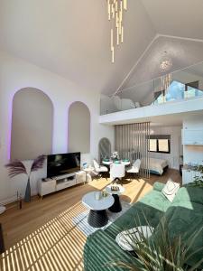 a living room with a couch and a table at Panoramic House Baile Felix C2 in Baile Felix