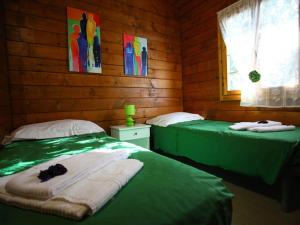 A bed or beds in a room at Villaggio La Bussola