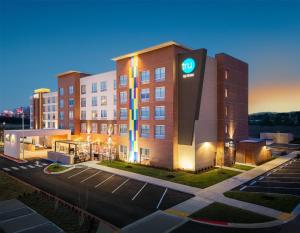 a hotel with a sign on the side of a building at Home2 Suites By Hilton Spring Hill in Spring Hill