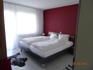 מיטה או מיטות בחדר ב-Haus Montanara