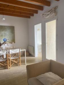 a living room with a couch and a table at Puerto de Cala Ratjada in Cala Ratjada +55 photos